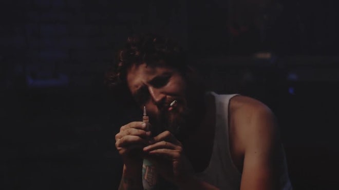 Man Lighting Cigarette - Stock Video