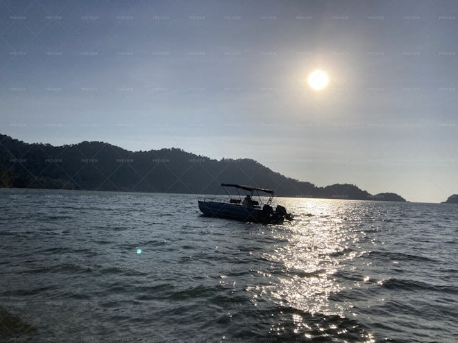 Boat Sun Ocean - Stock Photos | Motion Array