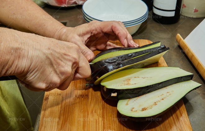 Male Hands Slicing Eggplant Knife Wooden Board Stock Photo by