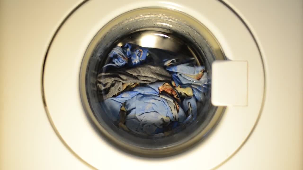 Clothes Spinning Inside Washing Machine Stock Video Motion Array