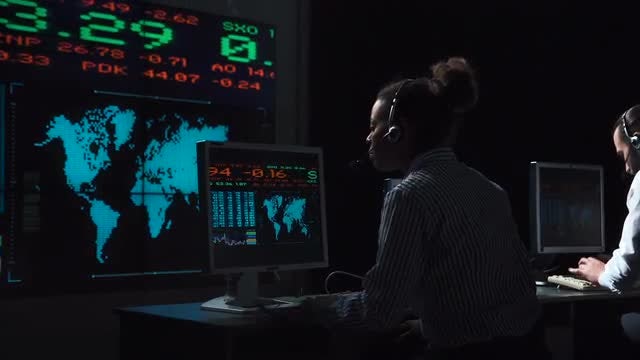 Female Financial Trader Working: Stock Video