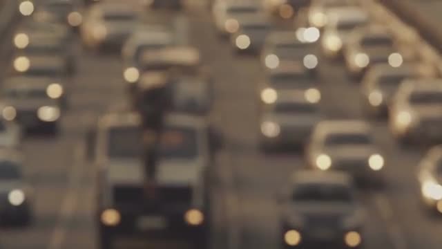 City Traffic At Sunset: Stock Video