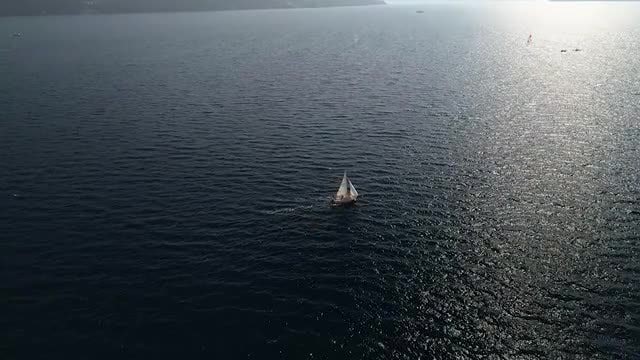 Boat Sailing As Evening Falls: Stock Video