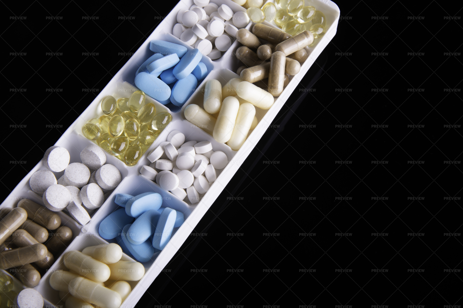 Plastic Container With Medications Stock Photos Motion Array   Preview 1262493 8kZMbIrkijWZGe2b Large 