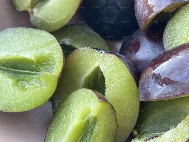 Fresh plums with leaves Stock Photo by katrinshine