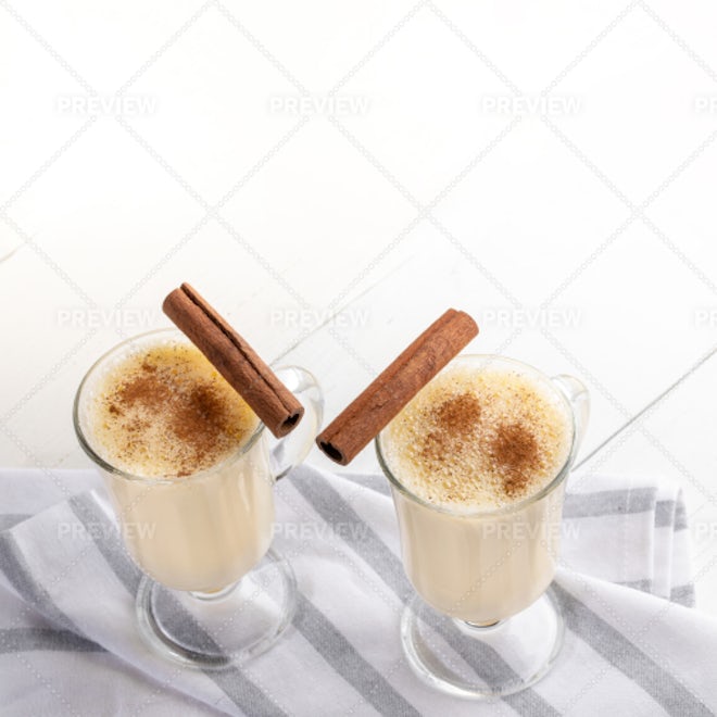 Two Glasses Of Eggnog On White - Stock Photos