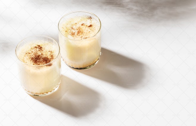 Two glasses of eggnog 32064230 Stock Photo at Vecteezy