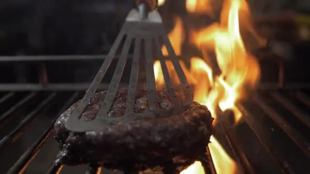 Beef Steak Pressed With Spatula: Stock Video