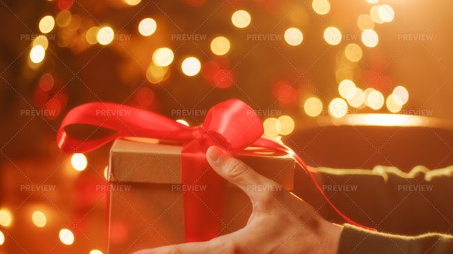 Man Holds Christmas Present Hands Happy Holiday Gift Box Christmas Stock  Photo by ©pilipeichenko 323587026