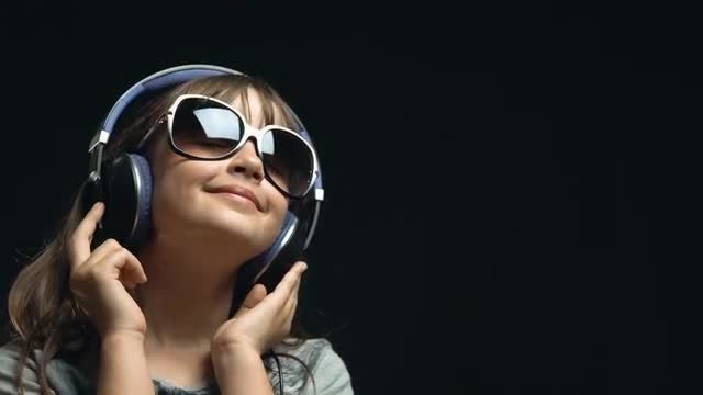 Closeup Of Girl With Headphones: Stock Video