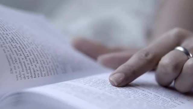 Book Being Read In Bed: Stock Video