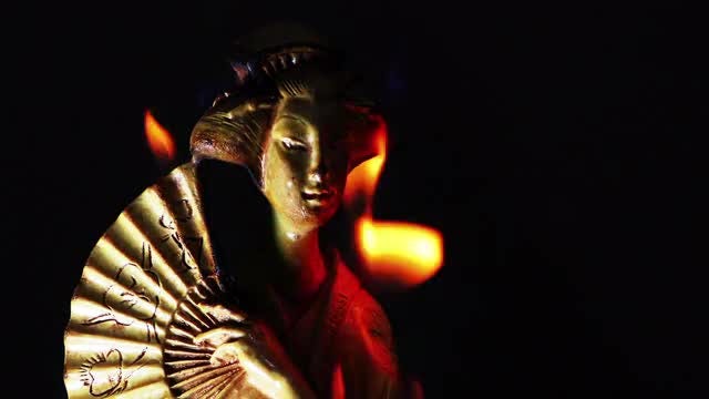 Japanese Girl Statue Catches Fire: Stock Video