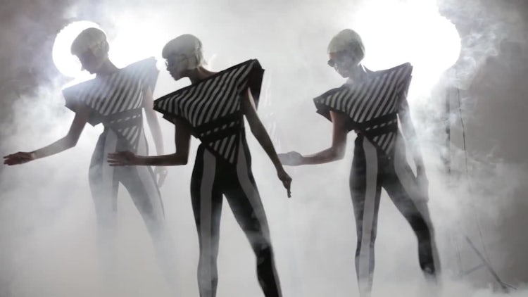 Futuristic Dancers In Smoky Background - Stock Video | Motion Array