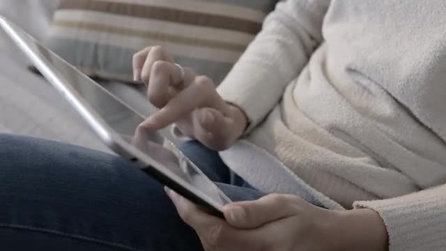 Woman Using A Digital Tablets: Stock Video
