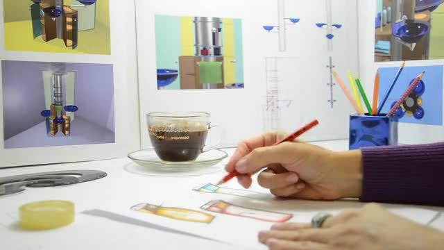 Industrial Designer Busy Designing Alternatives: Stock Video