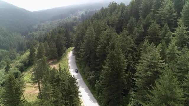 Vehicle Plies Mountain Road: Stock Video