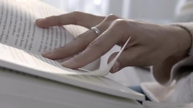 Reading In Sunlit Room: Stock Video