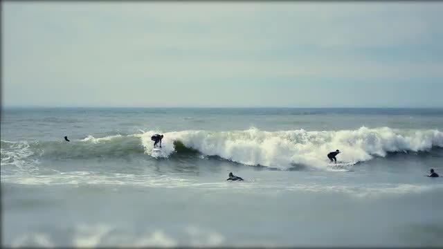 Tilt Shift Surfers Catching Waves: Stock Video