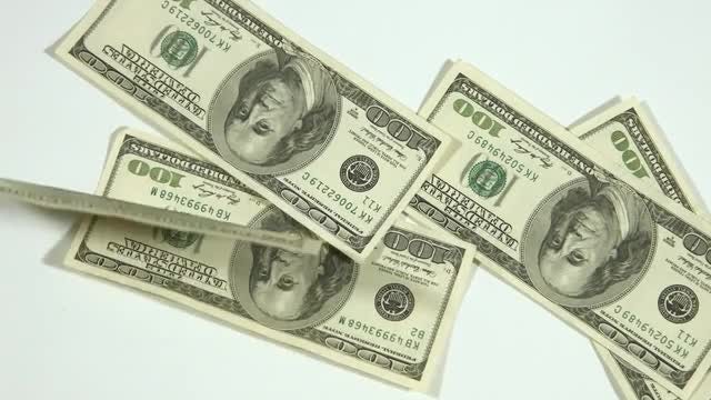 Dollars Falling On White Table: Stock Video