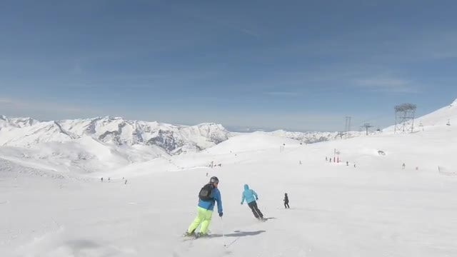 Alpine Skiers Going Downhill Quickly: Stock Video