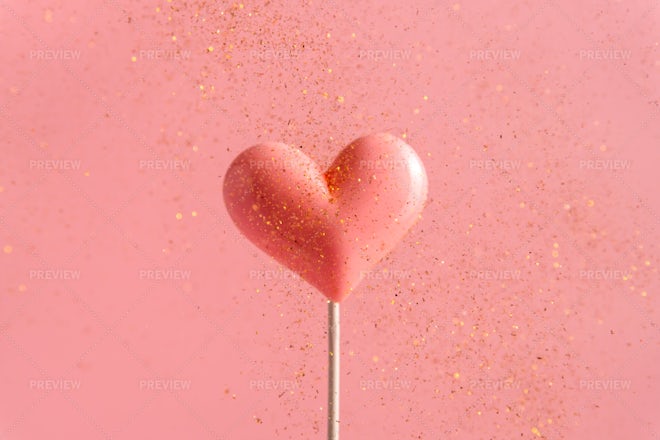Top View Heart Shaped Lollipops Pink Background Stock Photo by