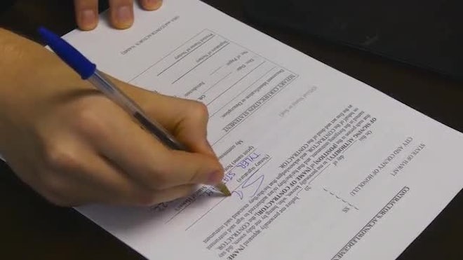 Sign Paper Document Man Signing A Paper Document - Stock Video | Motion Array