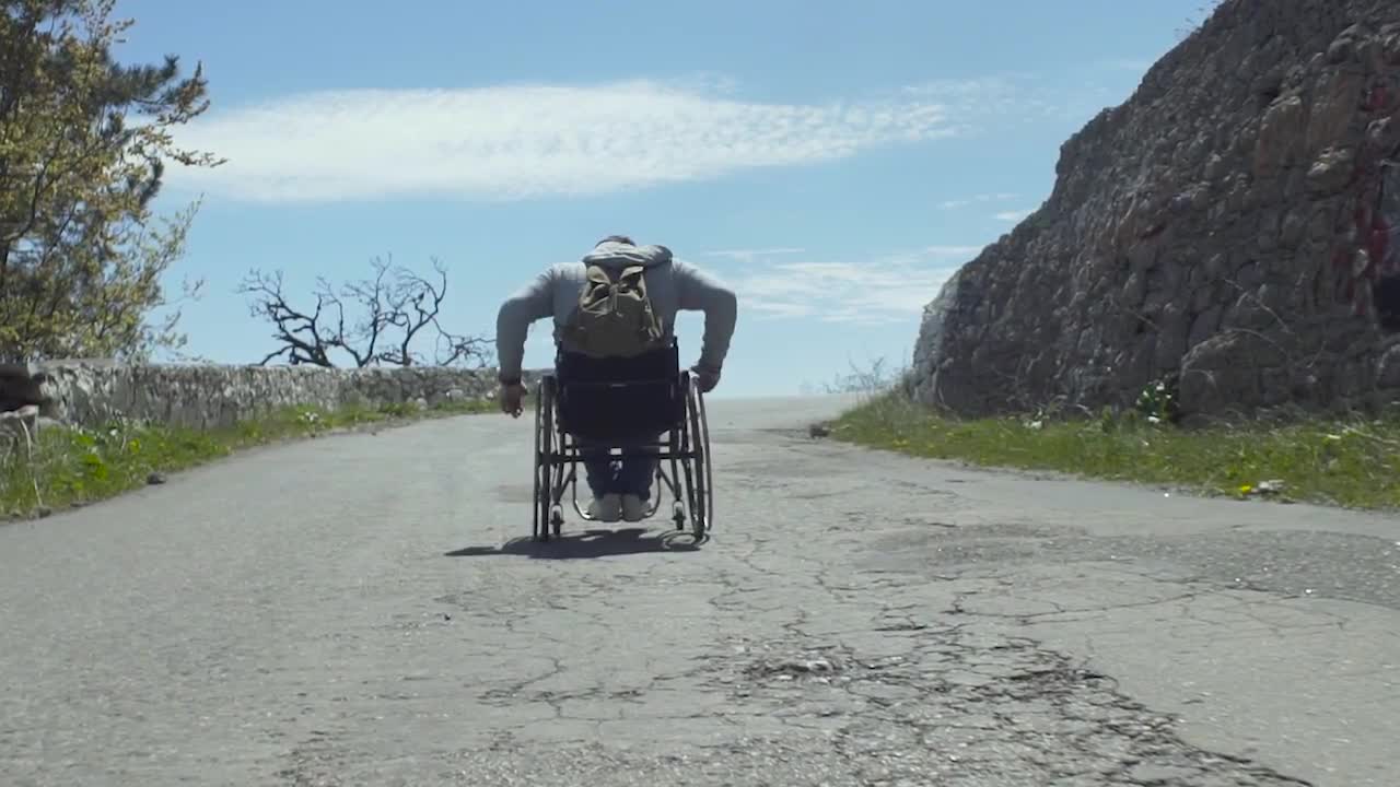 Slow Motion Uphill Wheelchair Stock Video Motion Array