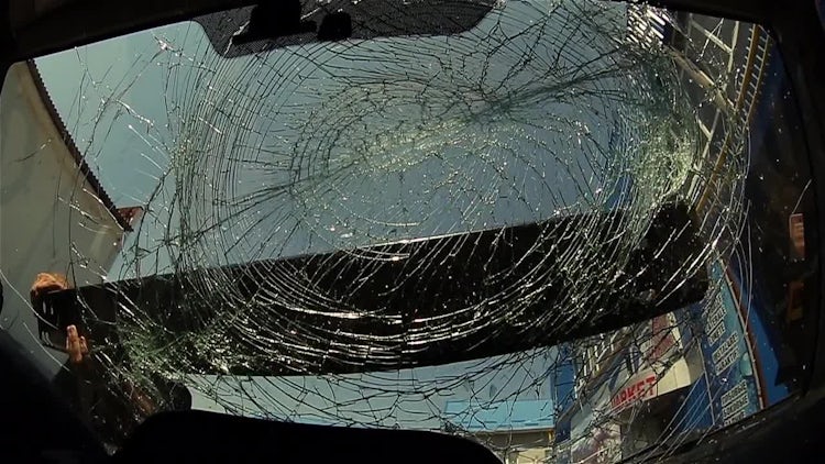Masked Thug Vandalizing A Car: Stock Video