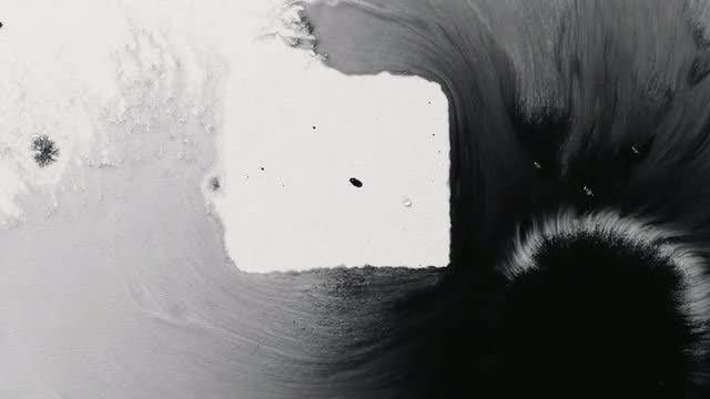 White And Black Ink Blending: Stock Video