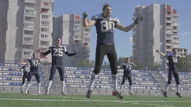 Football Team Trains Before Game: Stock Video
