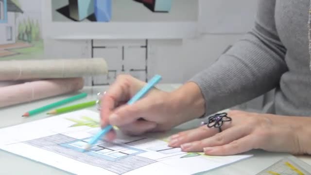 Drawing House In The Office: Stock Video