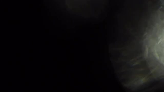 Light Leaks Over Black Background: Stock Video