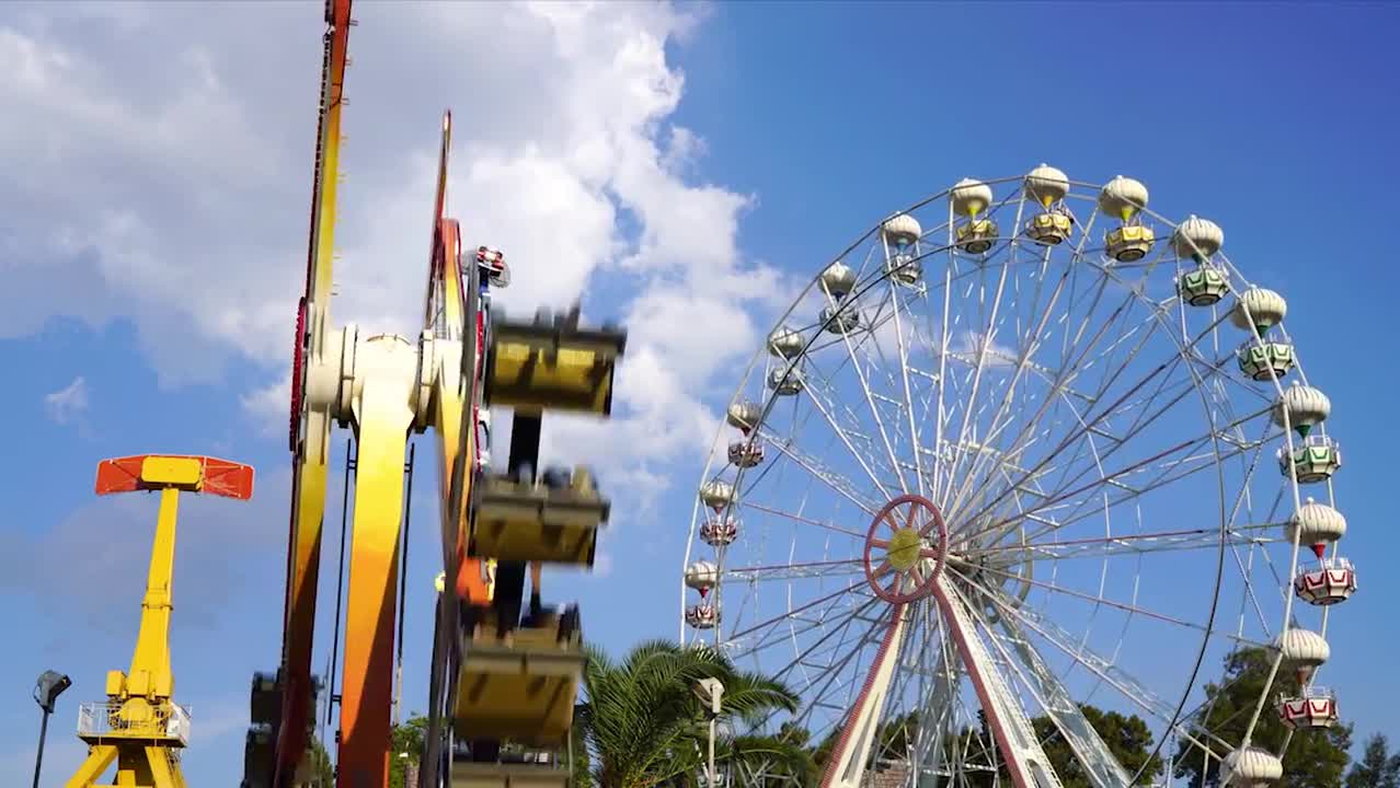 Ferris Wheel And Swing Ride Stock Video Motion Array