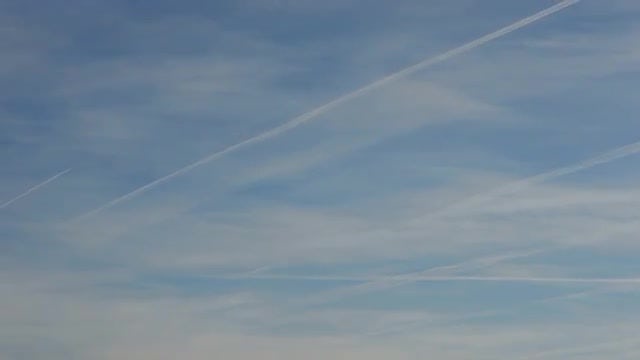 Planes Leave Trails In The Sky: Stock Video