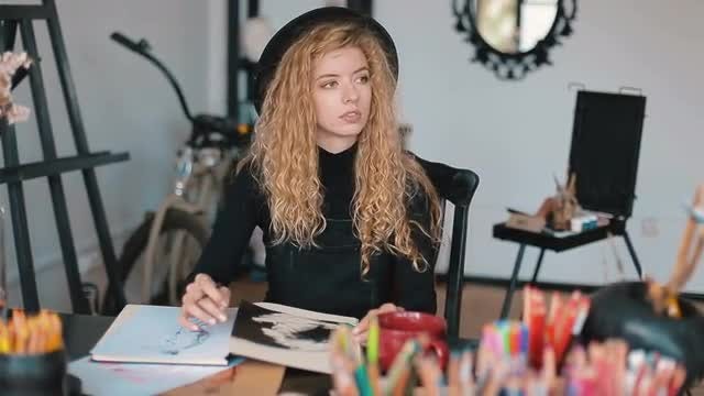 Female Painter Coloring Her Sketch: Stock Video