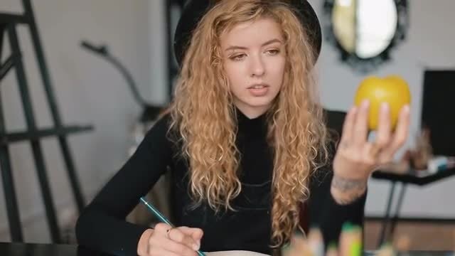 Artist Draws Yellow Apple: Stock Video