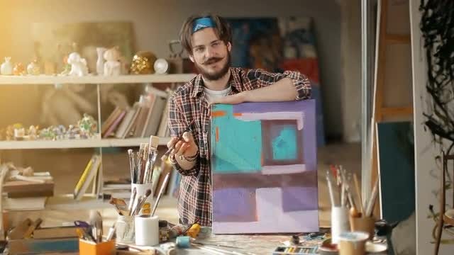 Artist Educates Others About Painting: Stock Video