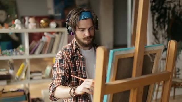 Artist Paints Picture With Great Passion: Stock Video