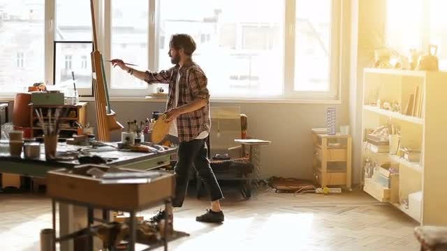 Man Paints A Picture: Stock Video