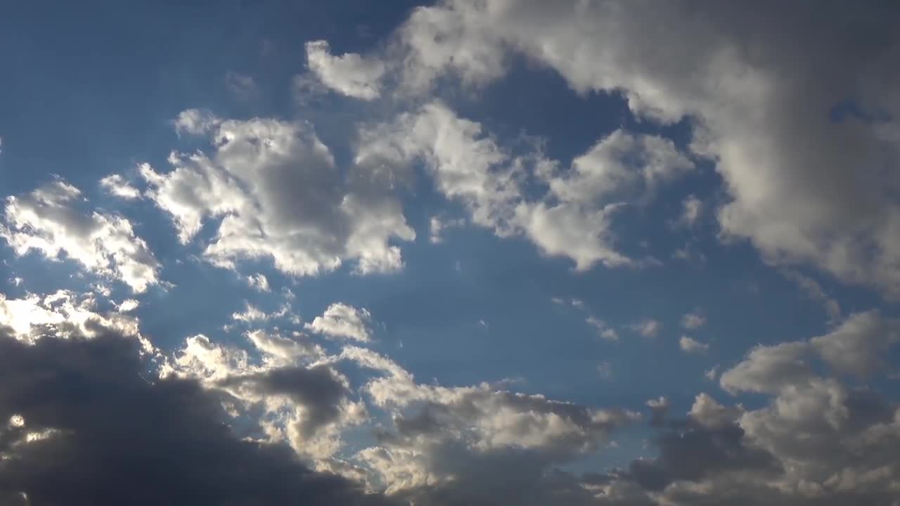 Cumulus Clouds And The Blue Winter Sky - Stock Video | Motion Array