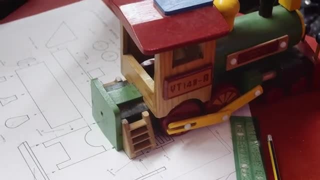 Toy Train With Construction Plans: Stock Video
