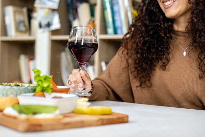 Woman Holding Very Large Glass Of Red Wine Stock Photo, Picture