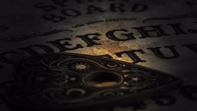 Close-Up Of A Ouija Board: Stock Video