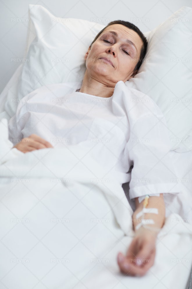 sick woman in bed