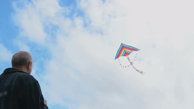 Senior Man Flying Kite: Stock Video