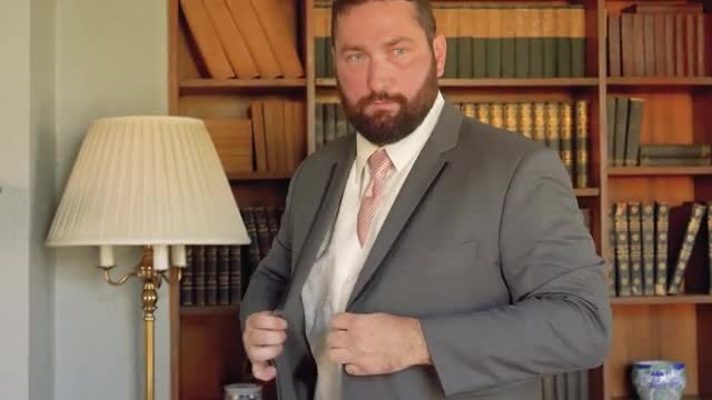 Groom Buttons His Jacket: Stock Video
