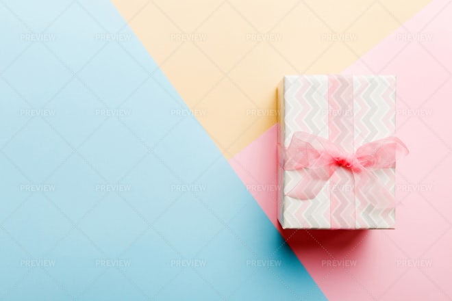 Pink Ribbon For Gift Wrapping On A Solid Pink Background Stock