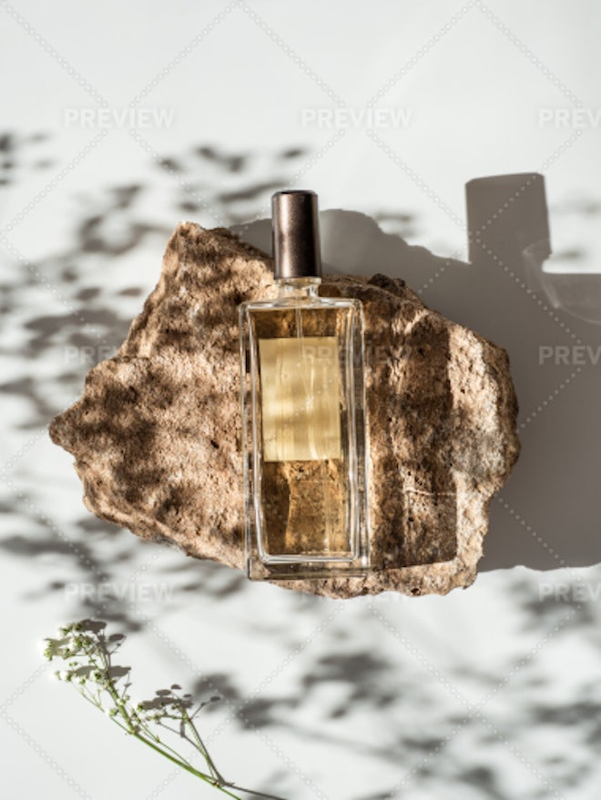 Perfume Bottle on Stone Podium - a Royalty Free Stock Photo from Photocase