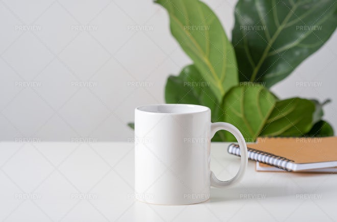 White Blank Mugs On A Table - Stock Photos