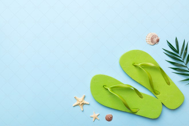 Premium Photo  A pair of slippers that say'palm leaf'on it